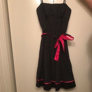 Black with white Polk-a-dot dress with pink detail